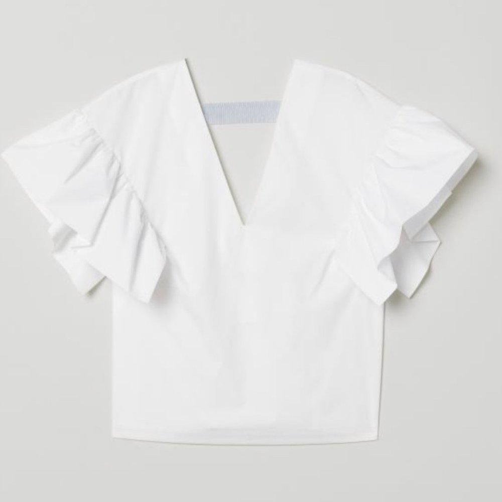 H&M Cotton blouse with a deep V-neck front and back light blue strap